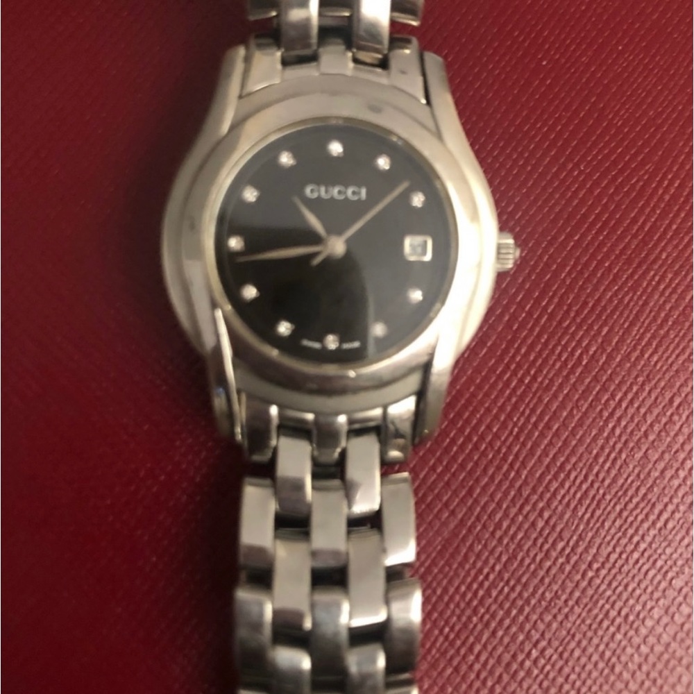 Authentic stainless Gucci watch